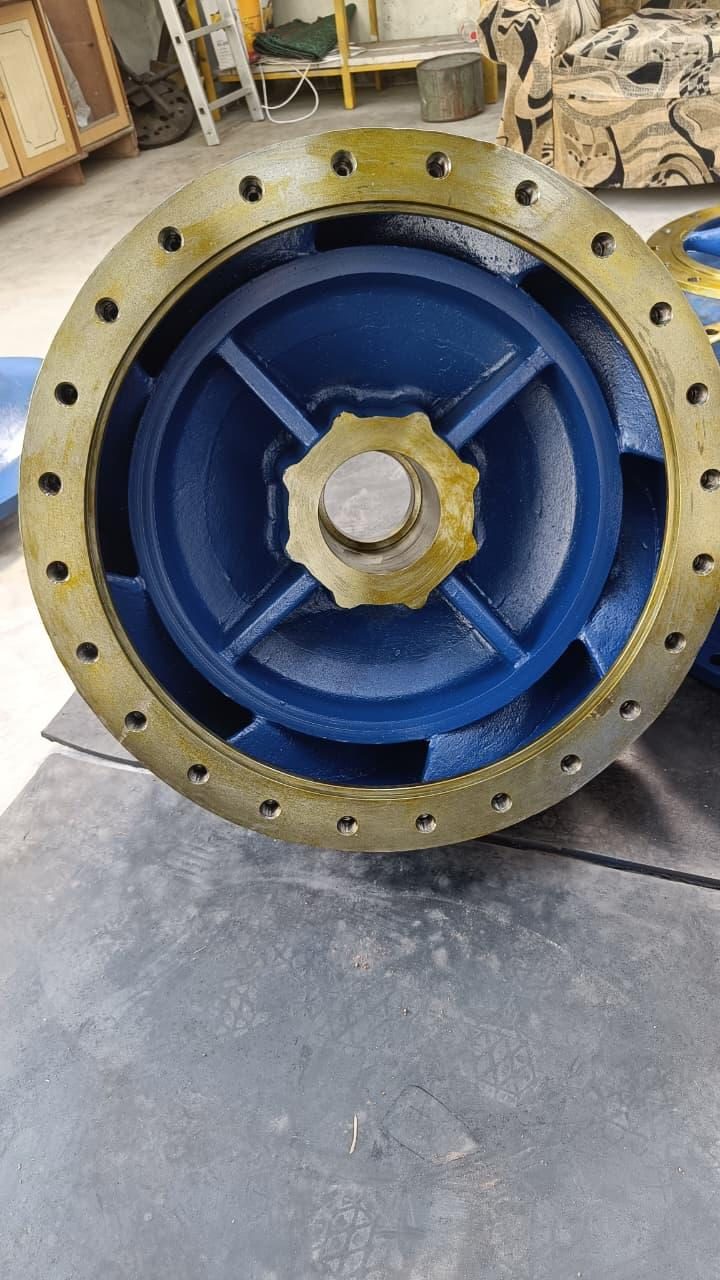 Blue and gold pump bowl assembly with impeller