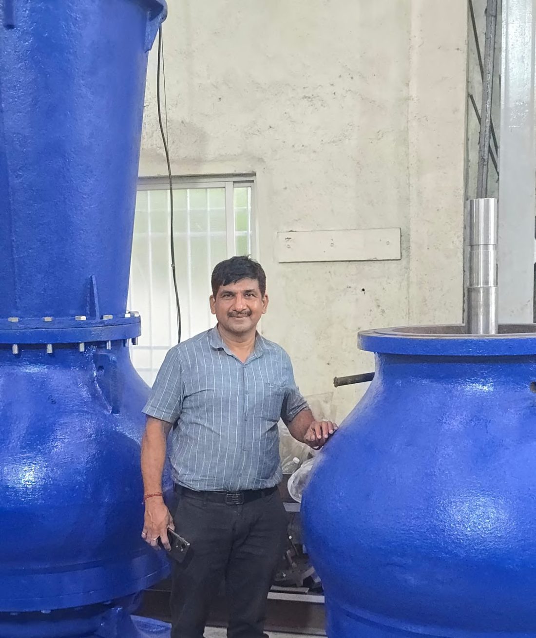 Avinash Patil, Director of Incoses Engineering, with a vertical turbine pump bowl