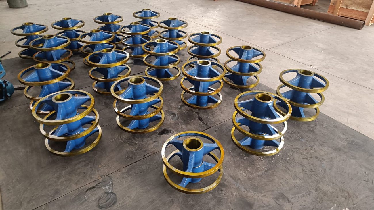 Large batch of blue and gold wear ring assemblies