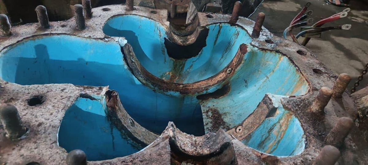 Worn, corroded impeller before repair