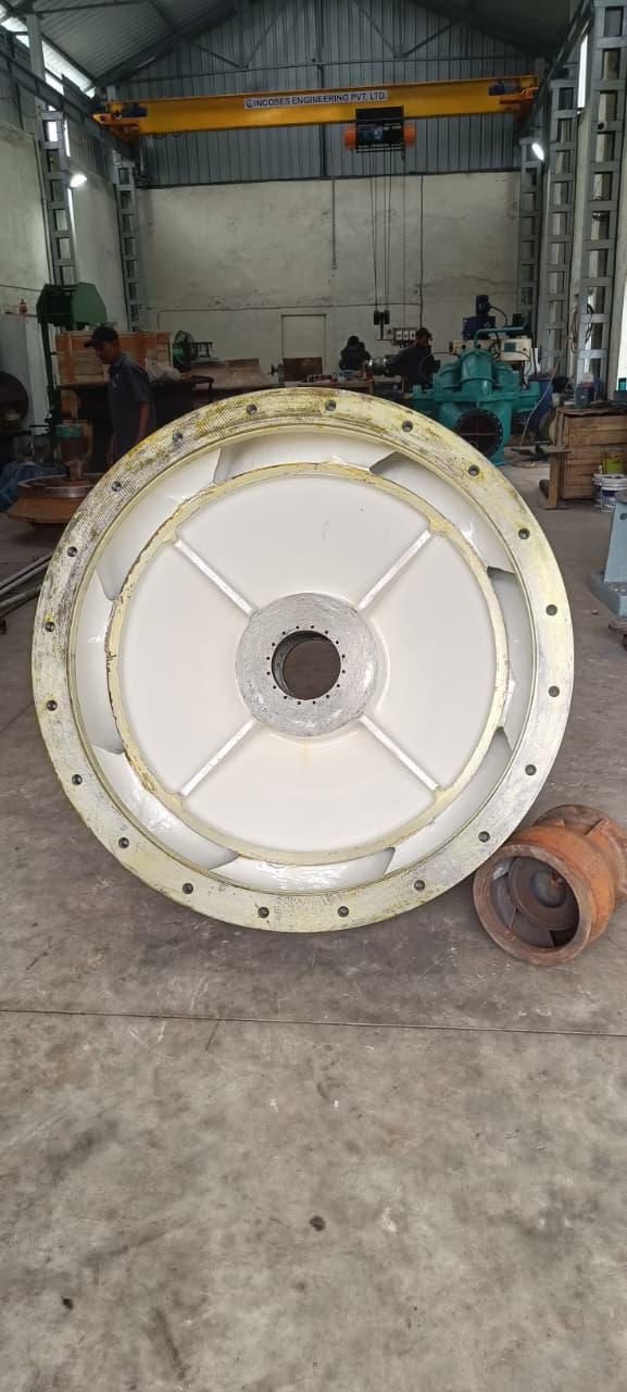 Large machined impeller in workshop with Incoses-branded EOT crane